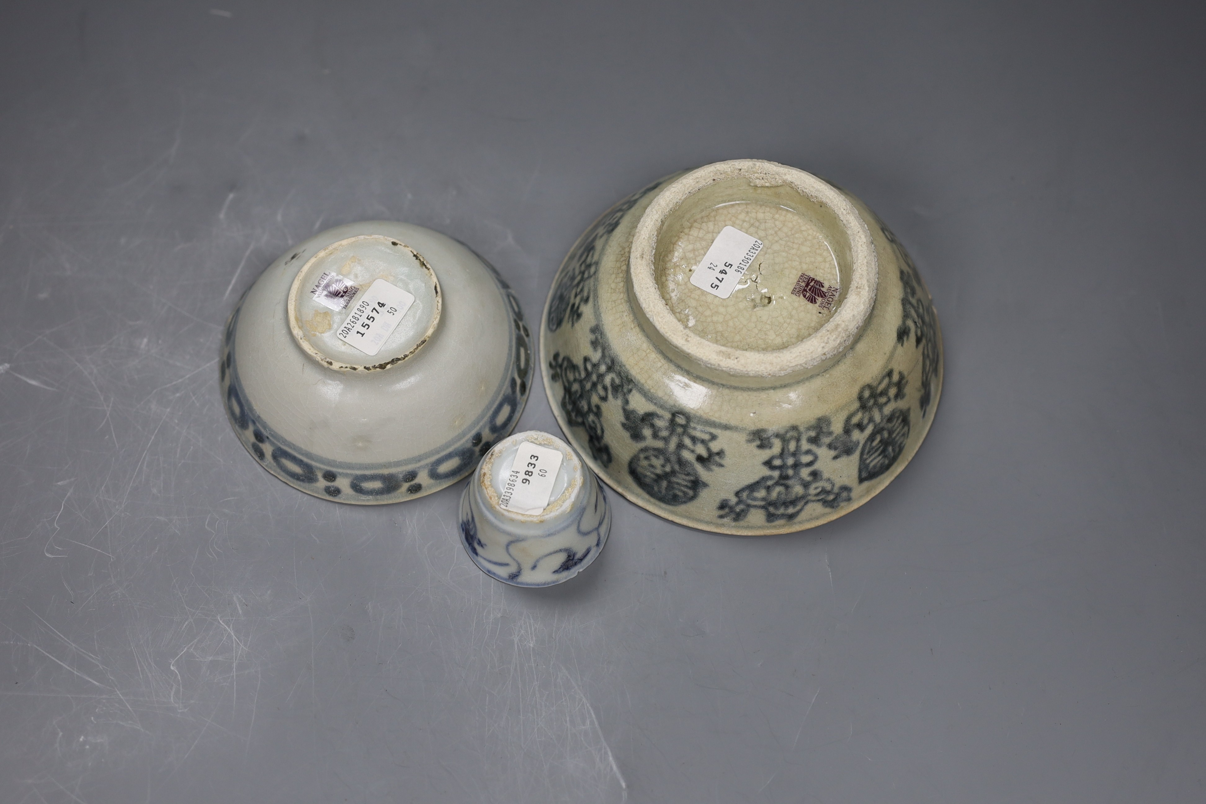 Three Chinese Tek Sing blue and white bowls and a kitchen bowl, tallest 6cm